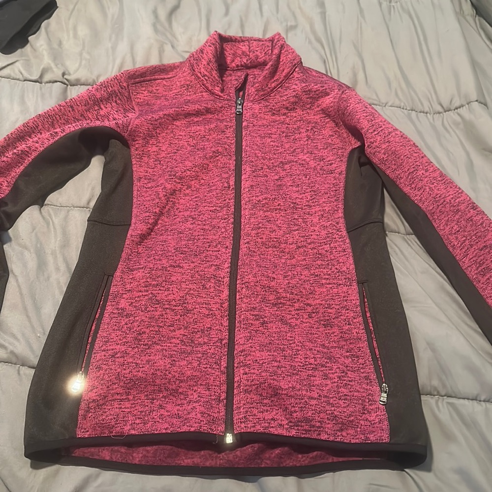 Black and purple athletic jacket, bought at Costco, never worn, size small.
